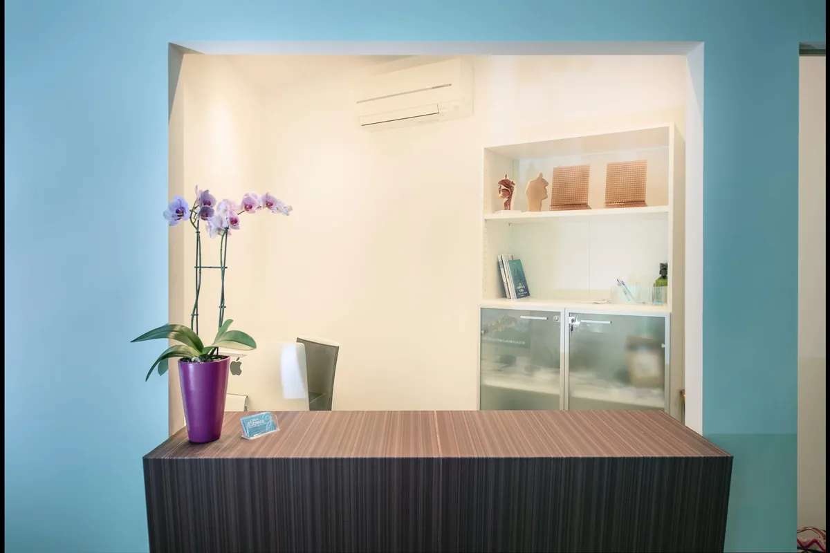 Reception desk at Clínica Eupnea, a medical centre in Palamós, in the province of Girona